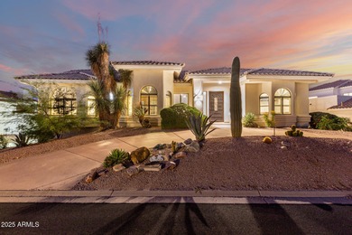 This stunning home is perfectly positioned on the Red Mountain on Red Mountain Ranch Country Club in Arizona - for sale on GolfHomes.com, golf home, golf lot