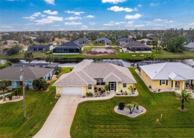 Captivating Canal Views from your Pool Area  A Spacious Design on Rotonda Golf and Country Club - Long Marsh  in Florida - for sale on GolfHomes.com, golf home, golf lot