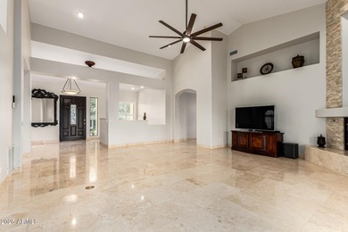 This stunning home is perfectly positioned on the Red Mountain on Red Mountain Ranch Country Club in Arizona - for sale on GolfHomes.com, golf home, golf lot