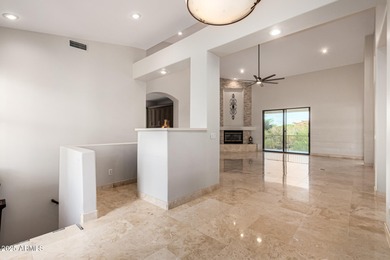 This stunning home is perfectly positioned on the Red Mountain on Red Mountain Ranch Country Club in Arizona - for sale on GolfHomes.com, golf home, golf lot