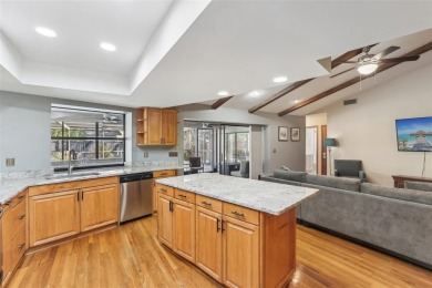 Welcome to this Beautiful Corner-Lot Ranch-Style Pool Home in on East Lake Woodlands Country Club in Florida - for sale on GolfHomes.com, golf home, golf lot
