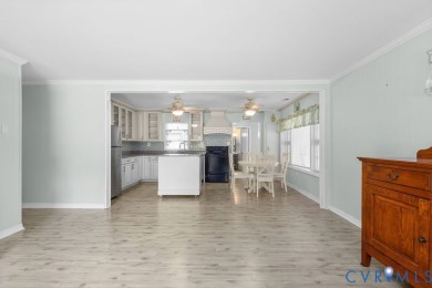 A short walk from the striking Piankatank River, this charming on Piankatank River Golf Club in Virginia - for sale on GolfHomes.com, golf home, golf lot