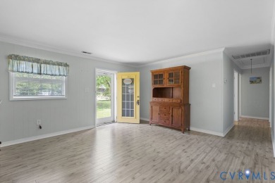 A short walk from the striking Piankatank River, this charming on Piankatank River Golf Club in Virginia - for sale on GolfHomes.com, golf home, golf lot