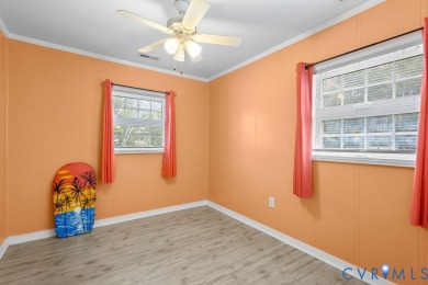 A short walk from the striking Piankatank River, this charming on Piankatank River Golf Club in Virginia - for sale on GolfHomes.com, golf home, golf lot