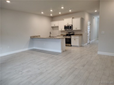 THE SANDHILL TOWNHOUSE - HOME FOR THE HOLIDAYS! YEARLY BLOWOUT on Inverness Golf and Country Club in Florida - for sale on GolfHomes.com, golf home, golf lot