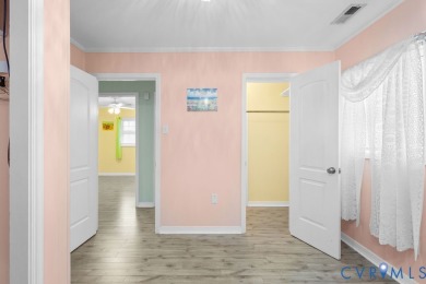 A short walk from the striking Piankatank River, this charming on Piankatank River Golf Club in Virginia - for sale on GolfHomes.com, golf home, golf lot