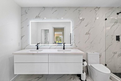 Experience luxurious living in this beautifully renovated 2nd on Quail Ridge Golf Course and Country Club in Florida - for sale on GolfHomes.com, golf home, golf lot