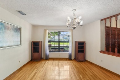 Welcome to this Beautiful Corner-Lot Ranch-Style Pool Home in on East Lake Woodlands Country Club in Florida - for sale on GolfHomes.com, golf home, golf lot
