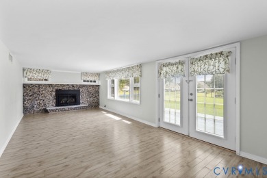 A short walk from the striking Piankatank River, this charming on Piankatank River Golf Club in Virginia - for sale on GolfHomes.com, golf home, golf lot
