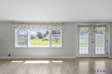A short walk from the striking Piankatank River, this charming on Piankatank River Golf Club in Virginia - for sale on GolfHomes.com, golf home, golf lot