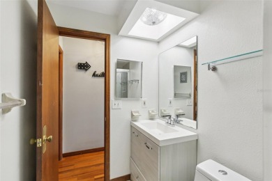 Welcome to this Beautiful Corner-Lot Ranch-Style Pool Home in on East Lake Woodlands Country Club in Florida - for sale on GolfHomes.com, golf home, golf lot