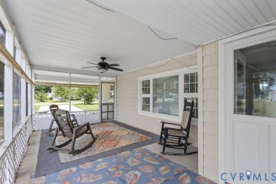 A short walk from the striking Piankatank River, this charming on Piankatank River Golf Club in Virginia - for sale on GolfHomes.com, golf home, golf lot