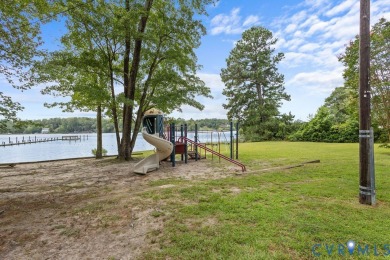 A short walk from the striking Piankatank River, this charming on Piankatank River Golf Club in Virginia - for sale on GolfHomes.com, golf home, golf lot