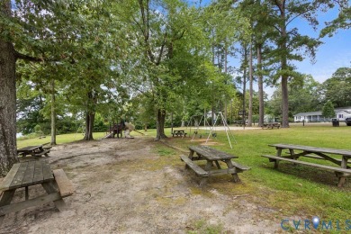 A short walk from the striking Piankatank River, this charming on Piankatank River Golf Club in Virginia - for sale on GolfHomes.com, golf home, golf lot