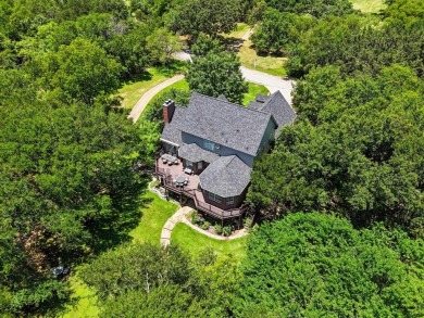 Discover the epitome of elegance in this spacious 3-story on White Bluff Resort - New Course in Texas - for sale on GolfHomes.com, golf home, golf lot