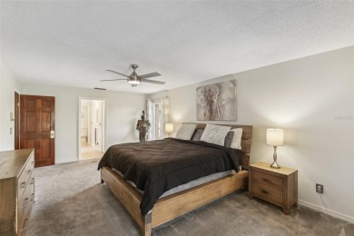 Welcome to this Beautiful Corner-Lot Ranch-Style Pool Home in on East Lake Woodlands Country Club in Florida - for sale on GolfHomes.com, golf home, golf lot