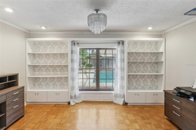 Welcome to this Beautiful Corner-Lot Ranch-Style Pool Home in on East Lake Woodlands Country Club in Florida - for sale on GolfHomes.com, golf home, golf lot