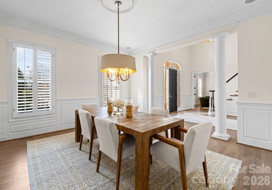 Stunning lakefront home in the exclusive gated community of on Carmel Country Club in North Carolina - for sale on GolfHomes.com, golf home, golf lot