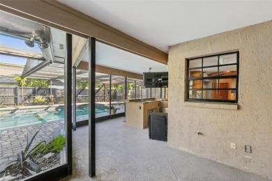 Welcome to this Beautiful Corner-Lot Ranch-Style Pool Home in on East Lake Woodlands Country Club in Florida - for sale on GolfHomes.com, golf home, golf lot