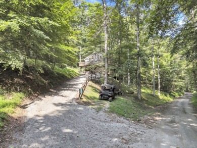 Motivated Seller! Wonderful 4 bedroom, 2 1/2 bath cabin in on Hide-A-Way Hills Club in Ohio - for sale on GolfHomes.com, golf home, golf lot