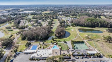 Welcome to your dream condo in the prestigious Golf View Villas on Seven Springs Golf and Country Club in Florida - for sale on GolfHomes.com, golf home, golf lot