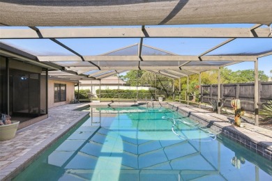 Welcome to this Beautiful Corner-Lot Ranch-Style Pool Home in on East Lake Woodlands Country Club in Florida - for sale on GolfHomes.com, golf home, golf lot