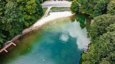 Motivated Seller! Wonderful 4 bedroom, 2 1/2 bath cabin in on Hide-A-Way Hills Club in Ohio - for sale on GolfHomes.com, golf home, golf lot