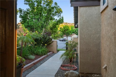 A wonderful home nestled high in the hills of Anaheim surrounded on Anaheim Hills Golf Course in California - for sale on GolfHomes.com, golf home, golf lot