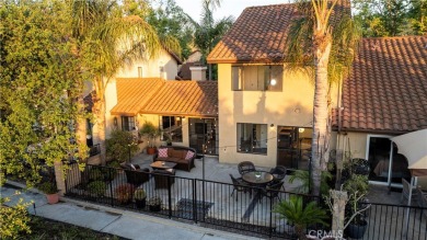 A wonderful home nestled high in the hills of Anaheim surrounded on Anaheim Hills Golf Course in California - for sale on GolfHomes.com, golf home, golf lot