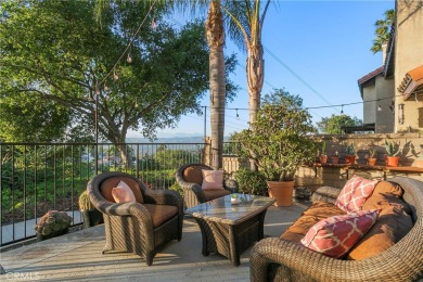 A wonderful home nestled high in the hills of Anaheim surrounded on Anaheim Hills Golf Course in California - for sale on GolfHomes.com, golf home, golf lot