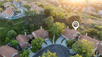 A wonderful home nestled high in the hills of Anaheim surrounded on Anaheim Hills Golf Course in California - for sale on GolfHomes.com, golf home, golf lot