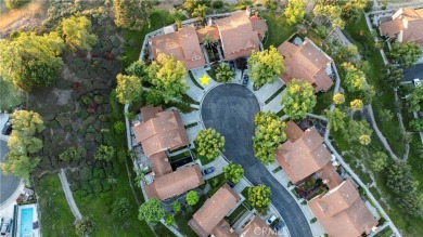 A wonderful home nestled high in the hills of Anaheim surrounded on Anaheim Hills Golf Course in California - for sale on GolfHomes.com, golf home, golf lot