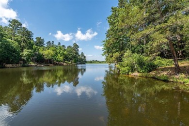 Stunning water views from this one-of-a-kind waterfront retreat on Holly Lake Ranch Golf Club in Texas - for sale on GolfHomes.com, golf home, golf lot