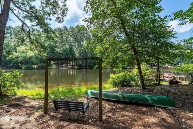 Stunning water views from this one-of-a-kind waterfront retreat on Holly Lake Ranch Golf Club in Texas - for sale on GolfHomes.com, golf home, golf lot