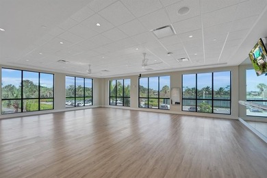 Expanded Brittany model with 2,980 sq ft under air offers a on Boca Woods Country Club in Florida - for sale on GolfHomes.com, golf home, golf lot