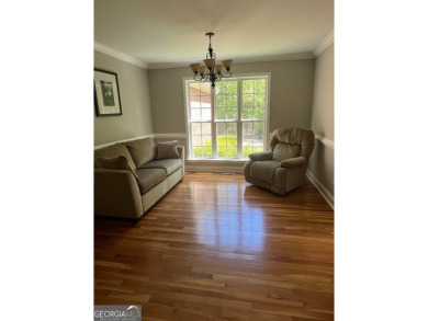 This beautiful home in sought after Fairfield Plantation boasts on Fairfield Plantation Golf and Country Club in Georgia - for sale on GolfHomes.com, golf home, golf lot