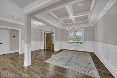 Exceptional curb appeal defines this beautifully designed on Cape Fear National At Brunswick Forest in North Carolina - for sale on GolfHomes.com, golf home, golf lot