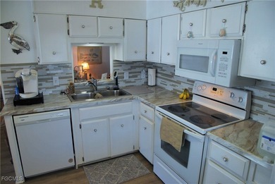 This well-maintained residence offers comfort, style, and peace on Six Lakes Country Club in Florida - for sale on GolfHomes.com, golf home, golf lot