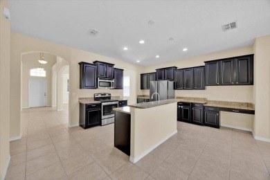 Stunning 5-bedroom, 3-bath home located in the highly on Providence Golf Club in Florida - for sale on GolfHomes.com, golf home, golf lot