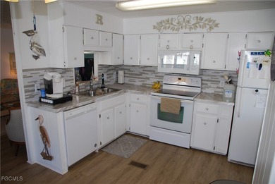 This well-maintained residence offers comfort, style, and peace on Six Lakes Country Club in Florida - for sale on GolfHomes.com, golf home, golf lot