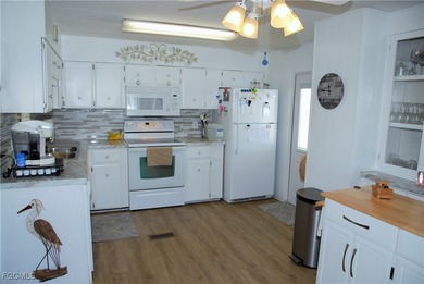 This well-maintained residence offers comfort, style, and peace on Six Lakes Country Club in Florida - for sale on GolfHomes.com, golf home, golf lot