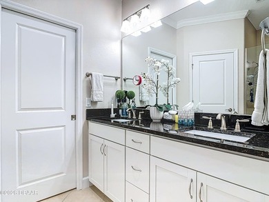 Pool home Alert! Welcome to paradise in this sought-after Key on LPGA International Golf Course in Florida - for sale on GolfHomes.com, golf home, golf lot