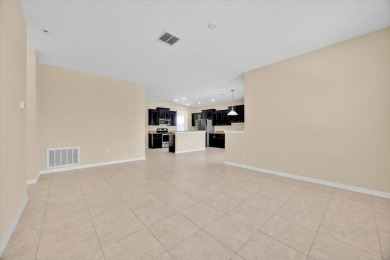 Stunning 5-bedroom, 3-bath home located in the highly on Providence Golf Club in Florida - for sale on GolfHomes.com, golf home, golf lot