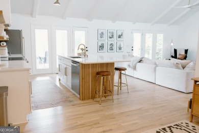 Step inside this one-of-a-kind mid-century home overlooking on Newnan Country Club in Georgia - for sale on GolfHomes.com, golf home, golf lot