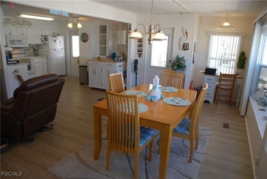 This well-maintained residence offers comfort, style, and peace on Six Lakes Country Club in Florida - for sale on GolfHomes.com, golf home, golf lot