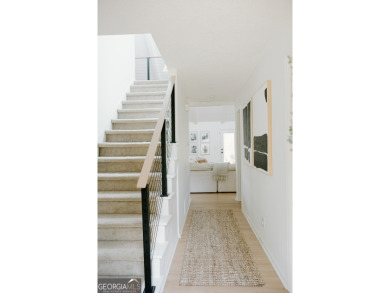 Step inside this one-of-a-kind mid-century home overlooking on Newnan Country Club in Georgia - for sale on GolfHomes.com, golf home, golf lot
