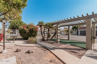 Stunning tri-level, gated waterfront townhome in Dobson Ranch's on Dobson Ranch Municipal Golf Course in Arizona - for sale on GolfHomes.com, golf home, golf lot