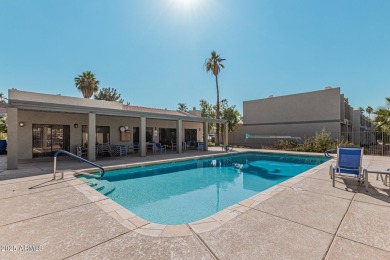 Stunning tri-level, gated waterfront townhome in Dobson Ranch's on Dobson Ranch Municipal Golf Course in Arizona - for sale on GolfHomes.com, golf home, golf lot