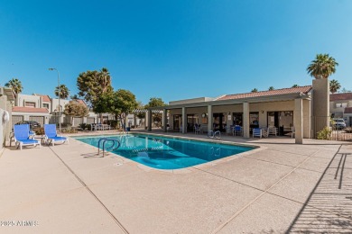 Stunning tri-level, gated waterfront townhome in Dobson Ranch's on Dobson Ranch Municipal Golf Course in Arizona - for sale on GolfHomes.com, golf home, golf lot