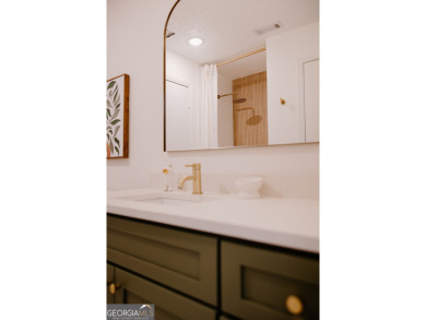 Step inside this one-of-a-kind mid-century home overlooking on Newnan Country Club in Georgia - for sale on GolfHomes.com, golf home, golf lot